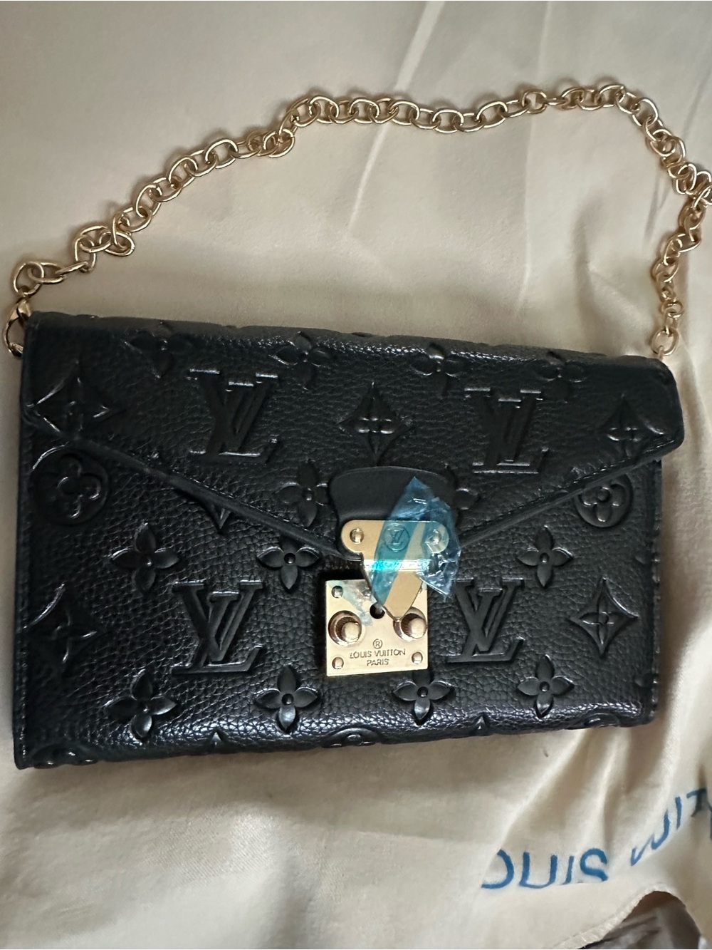 Louis Vuitton Black Embossed Monogram Chain Clutch with Gold Hardware